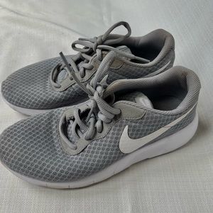 Nike grey sneakers in a size 6Y